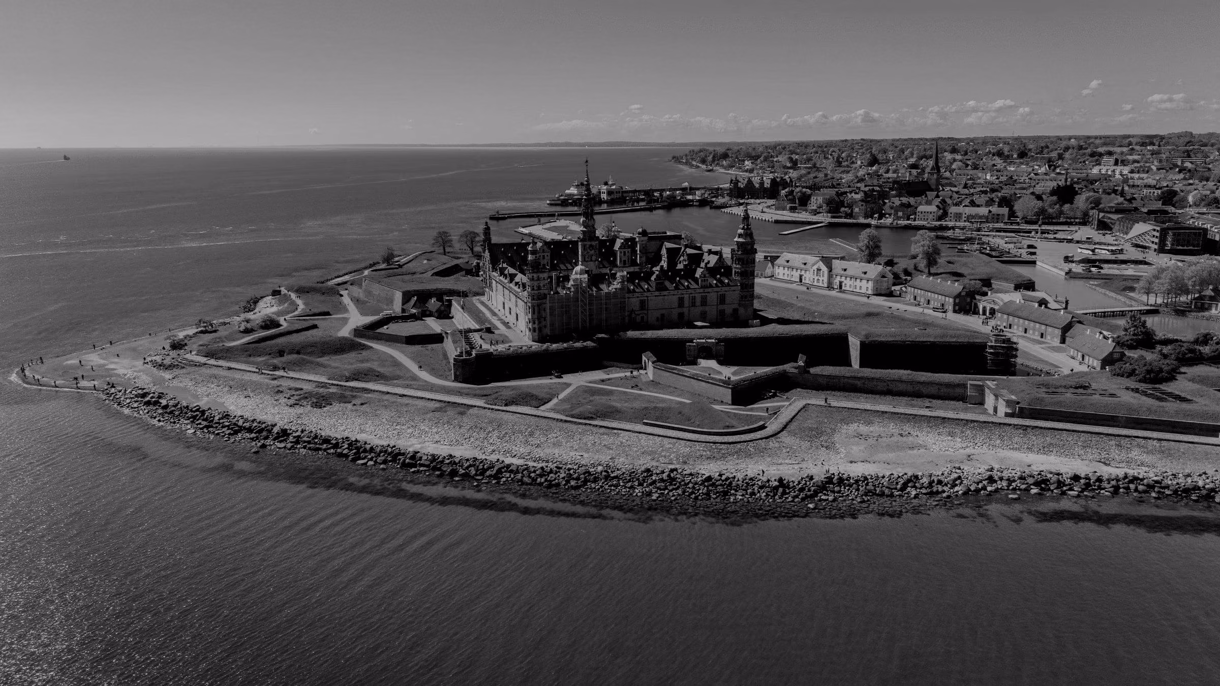 An aerial view of Kronborg Castle situated on the coast by the sea.
