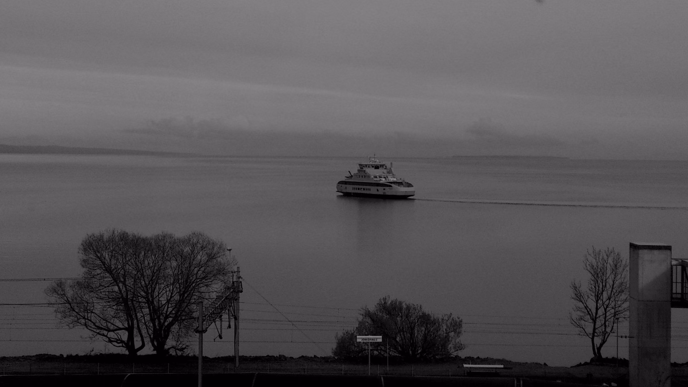 A ferry travels across a large body of water near Jönköping.